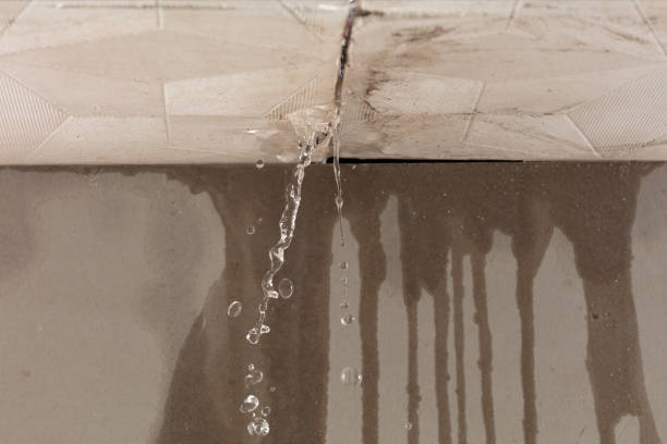 Professional Flood Damage Cleanup technician working in Watertown, NY